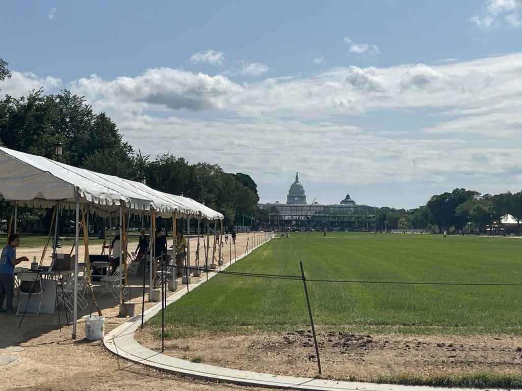 Event tents on the National Mall with the Capitol behind